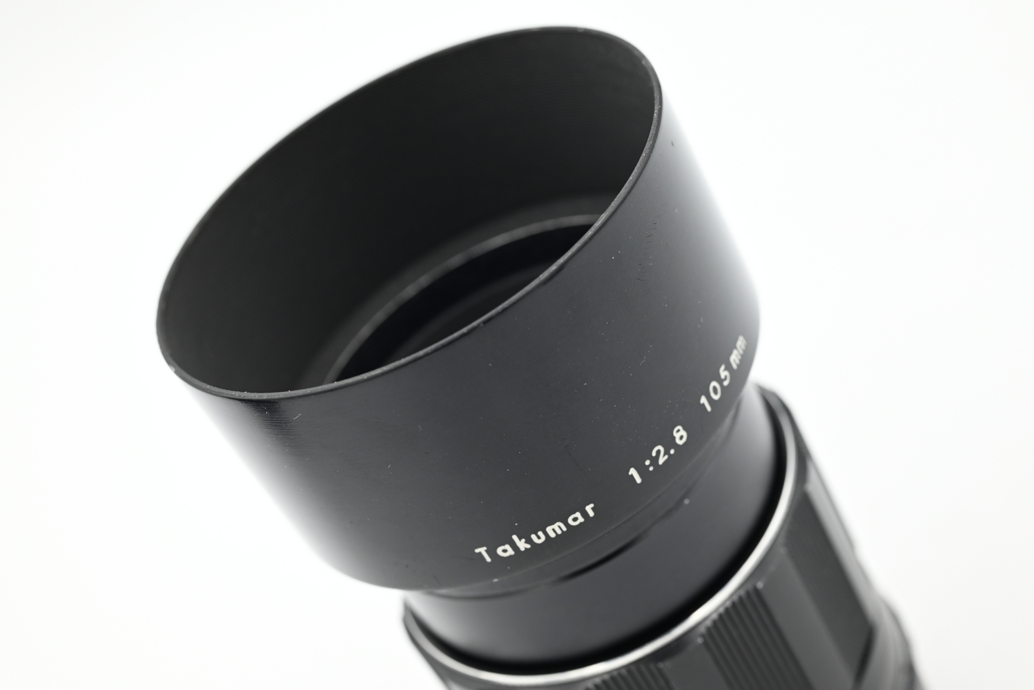 «Super-Multi-Coated TAKUMAR 1:2.8/105mm» в коллекционной комплектации (состояние 5-)